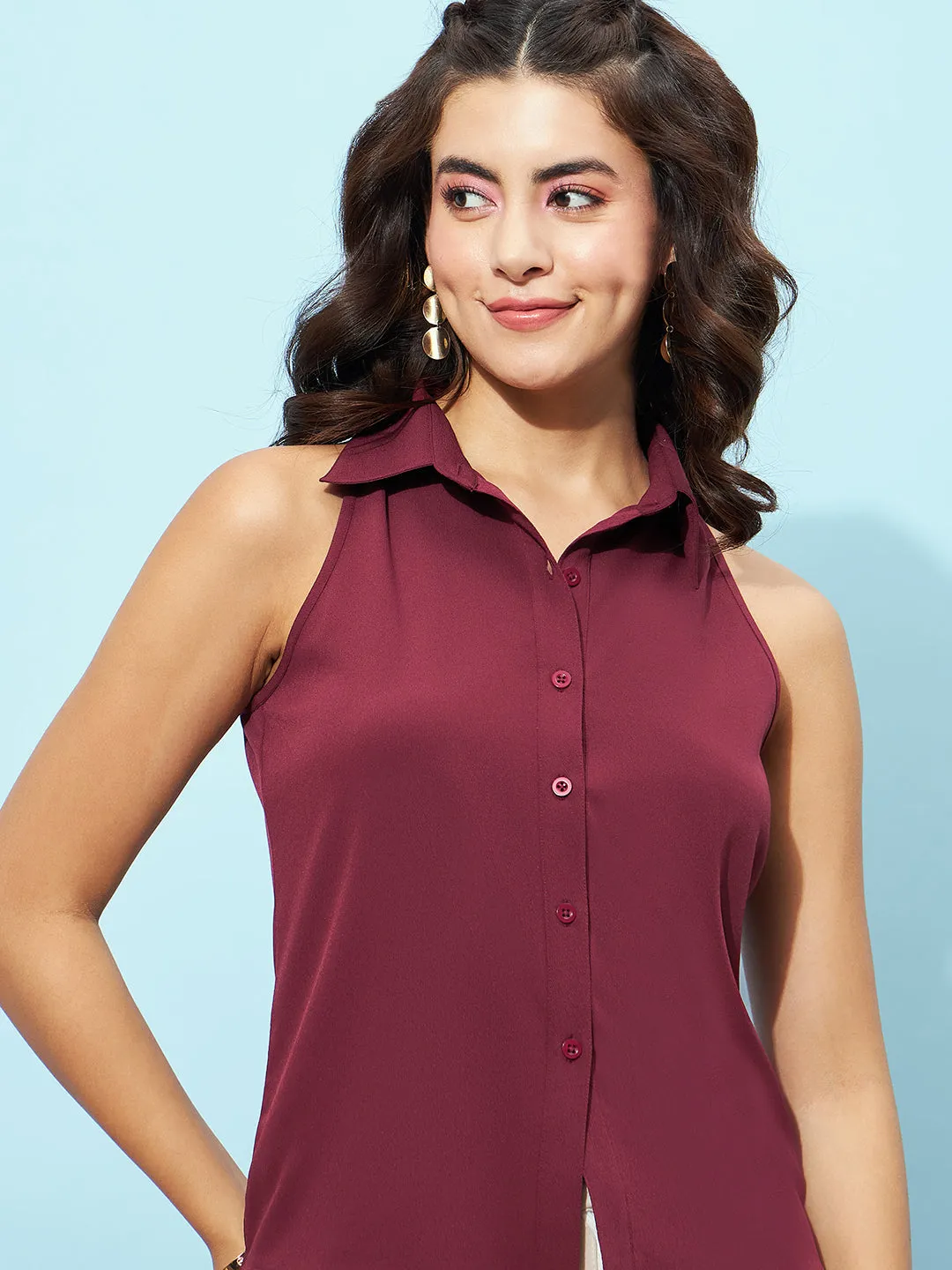 Berrylush Women Solid Maroon Spread Collar Neck Sleeveless Button-Up Curved Hem Regular Shirt